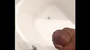 masturbating and cumshot in washroom