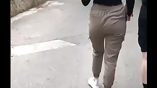 teenage girl have nice ass and walk on the road