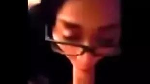 asian teen in glasses sucking a huge cock