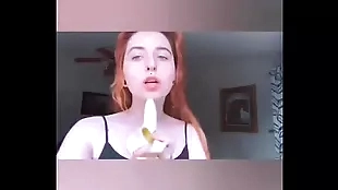 girl sucking banana